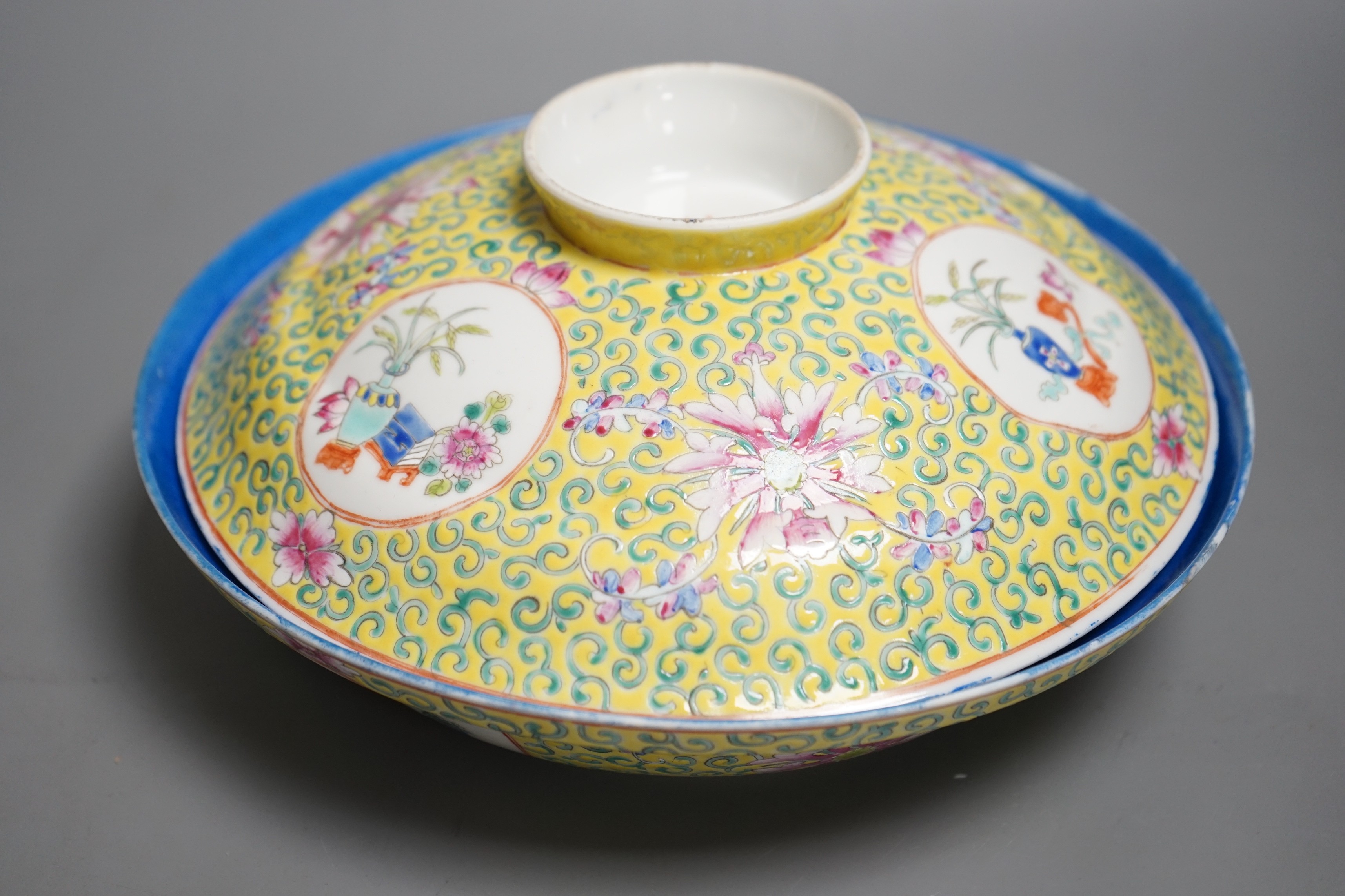 A large Chinese famille rose yellow ground bowl and cover, Republic period, 25cm diameter